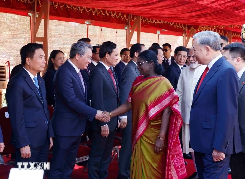 ttxvn-le-don-tong-bi-thu-chu-tich-nuoc-to-lam-tham-cap-nha-nuoc-toi-cong-hoa-an-do-16.jpg.jpg