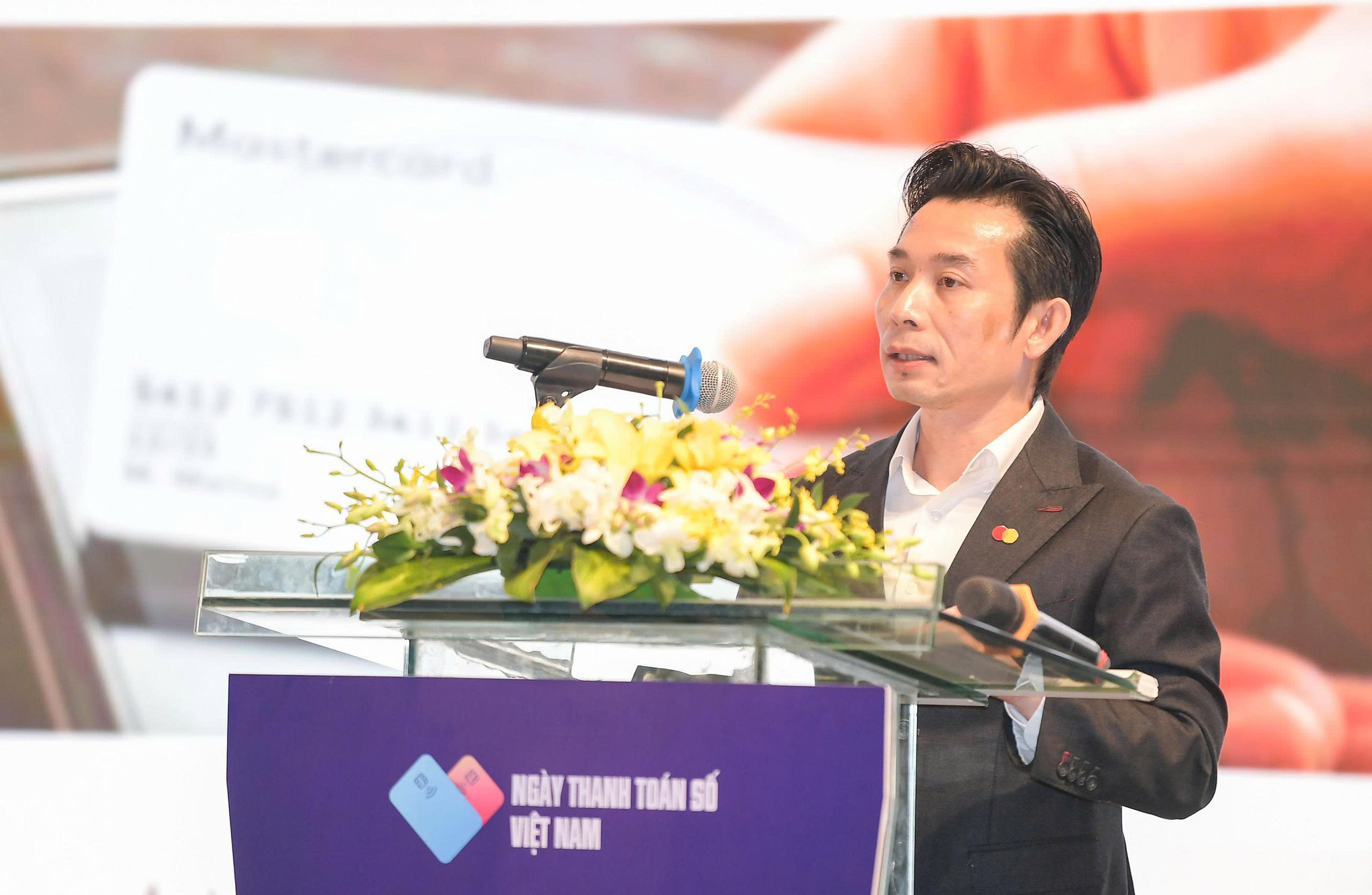 Đại diện Mastercard trình bày tại hội thảo