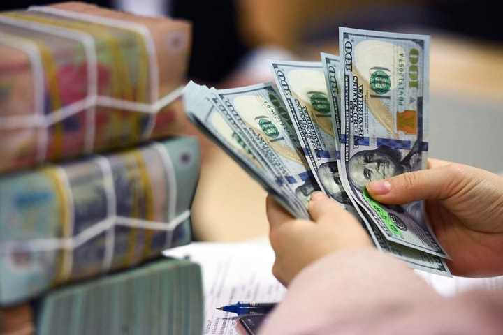 Tỷ giá trung tâm tăng 10 đồng, đồng USD giảm sau tuyên bố giữ nguyên lãi suất của FED