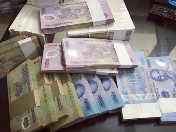 Đổi tiền lẻ dịp Tết: Cẩn trọng vi phạm pháp luật, sập bẫy lừa đảo